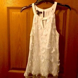 White sleeveless top